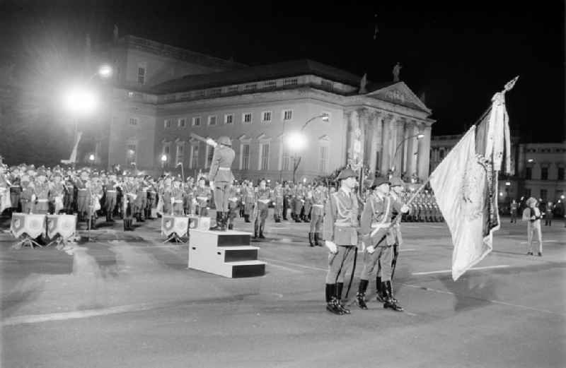 Parade formation and march of soldiers and officers, respectively music corps of the MfS guard regiment 'Feliks Dzierzynski' in front of the national memorial of the Neue Wache Unter den Linden in the district Mitte in Berlin, the former capital of the GDR, German Democratic Republic