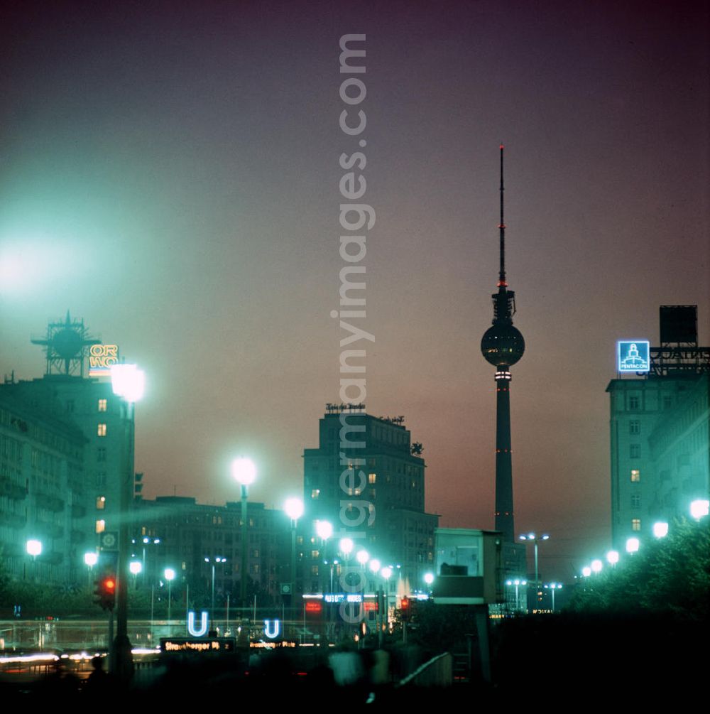 Aerial photograph at night Berlin - Nachtaufnahme: Karl-Marx-Allee am Strausberger Platz in Berlin mit Blick Richtung Haus des Kindes und Berliner Fernsehturm.