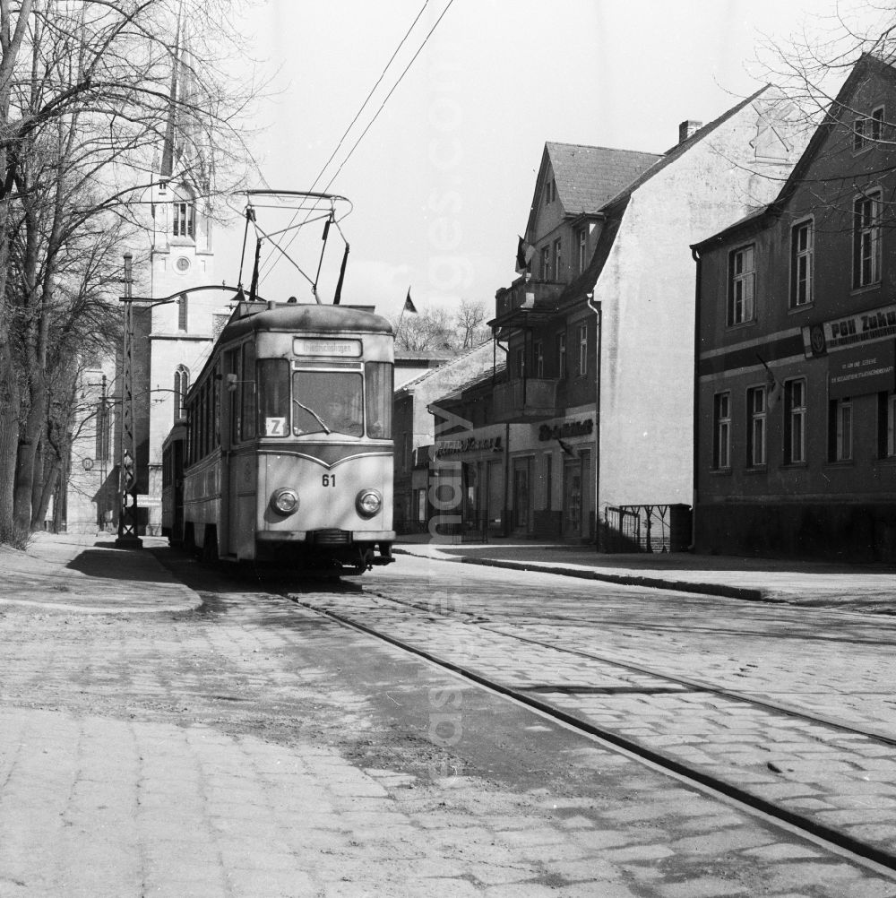 GDR photo archive: Rüdersdorf bei Berlin - Old town of Ruedersdorf with the Kalkberger church and a tram near Berlin in the federal state Brandenburg on the territory of the former GDR, German Democratic Republic