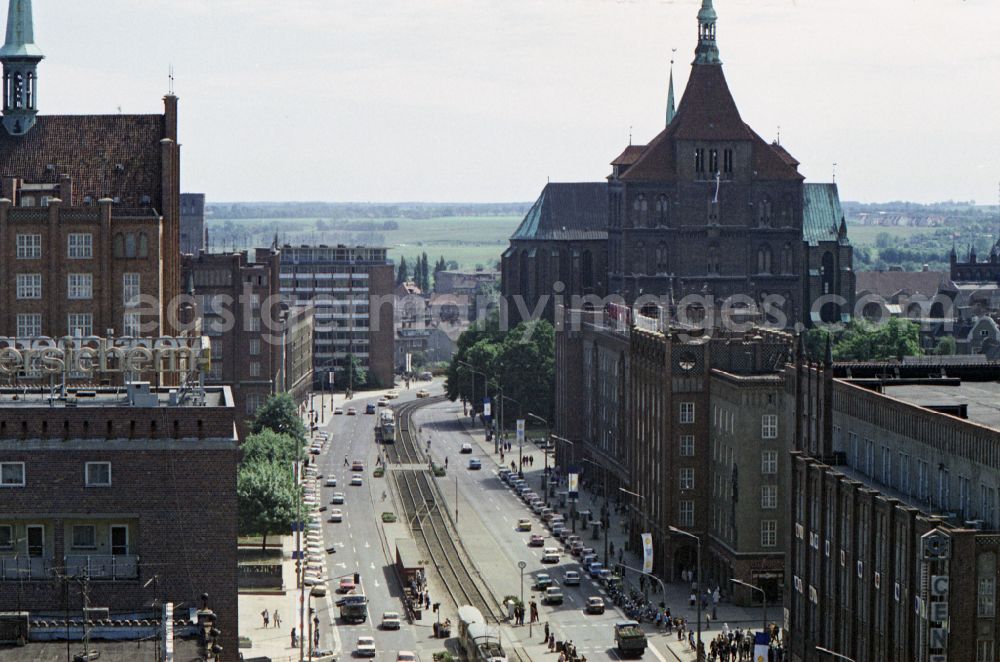 GDR photo archive: Rostock - Architecture with the St. Mary s Church in the street Lange Strasse in Rostock in the state Mecklenburg-Western Pomerania on the territory of the former GDR, German Democratic Republic