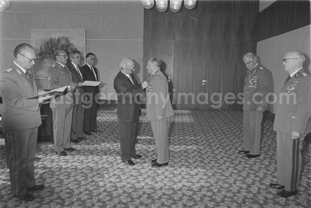 GDR picture archive: Berlin - Promotion and award hand over by Erich Honecker an Erich Mielke und Heinz Hoffmann in the district Mitte in Berlin, the former capital of the GDR, German Democratic Republic
