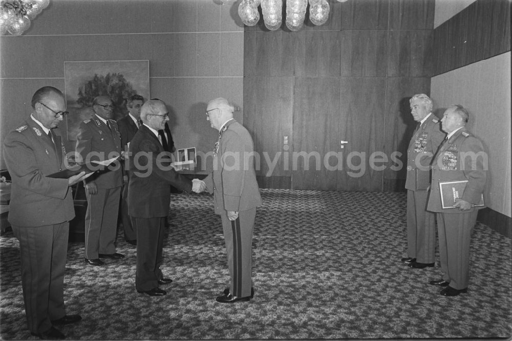 GDR photo archive: Berlin - Promotion and award hand over by Erich Honecker an Erich Mielke und Heinz Hoffmann in the district Mitte in Berlin, the former capital of the GDR, German Democratic Republic