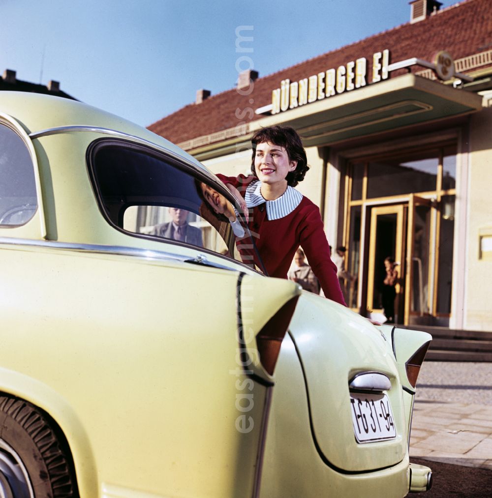 GDR picture archive: Dresden - A model poses at a car AWZ P5