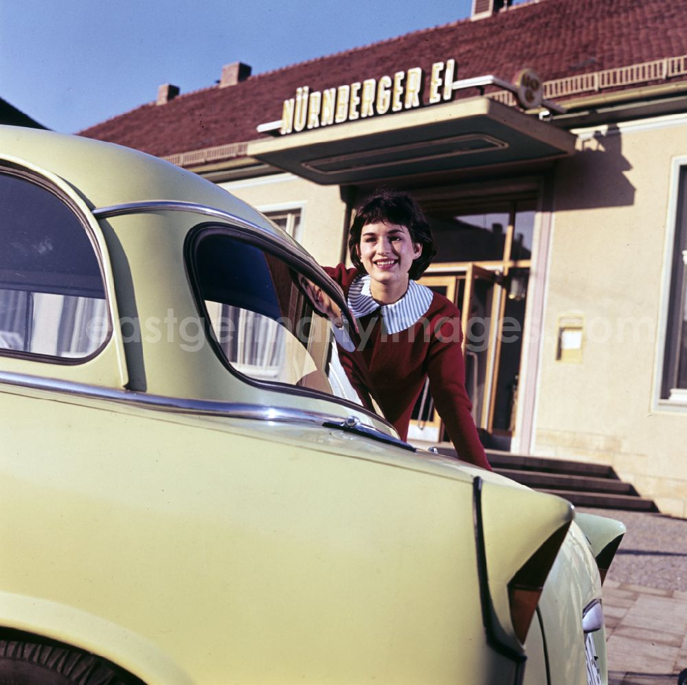 GDR photo archive: Dresden - A model poses at a car AWZ P5