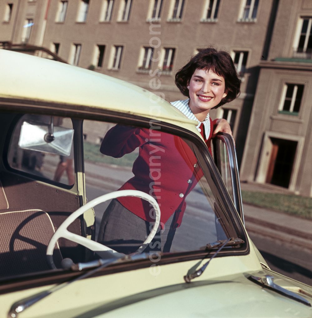 GDR photo archive: Dresden - A model poses at a car AWZ P5