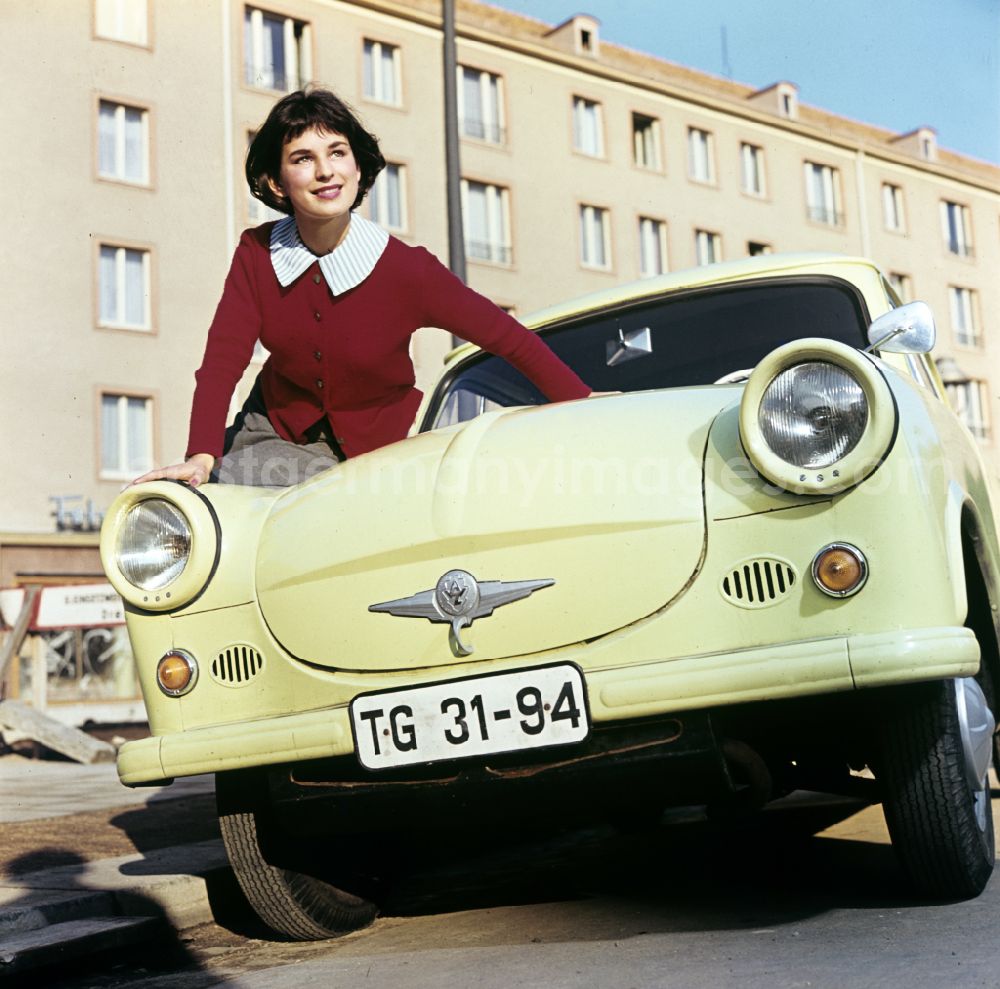 GDR picture archive: Dresden - A model poses at a car AWZ P5
