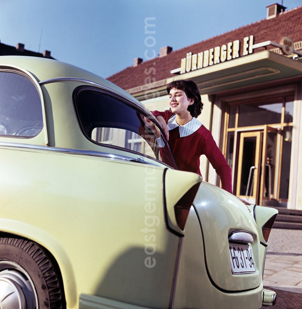 Dresden: A model poses at a car AWZ P5