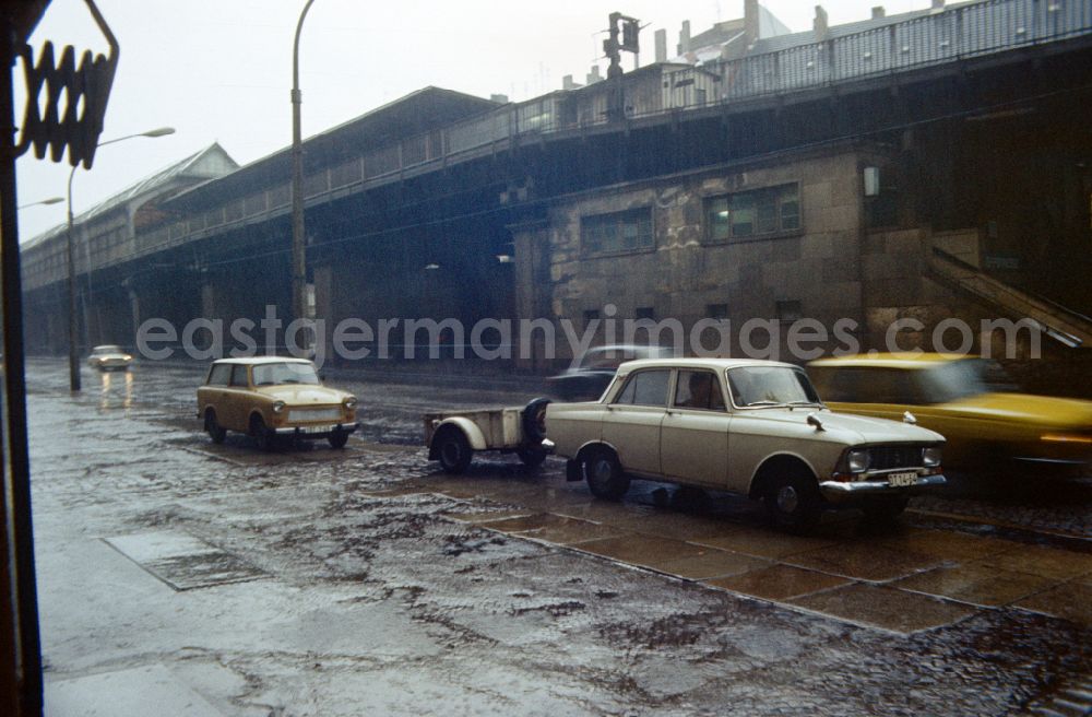 GDR picture archive: Berlin - Cars drive on Schoenhauser Alle in East Berlin in Prenzlauer Berg on the territory of the former GDR, German Democratic Republic