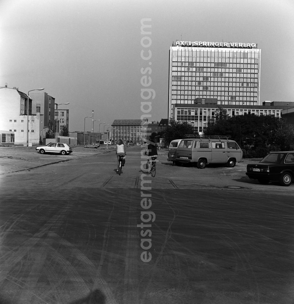 GDR picture archive: Berlin - View from the Zimmerstrasse on the former Berlin Wall to the publishing building Axel Springer in Berlin - Kreuzberg