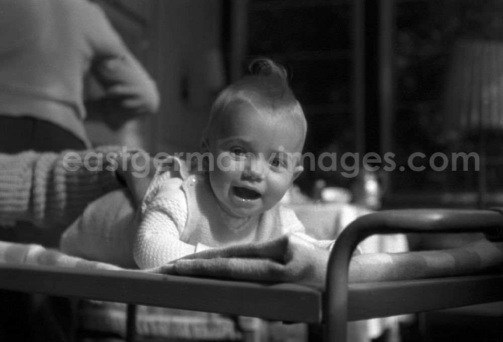 GDR image archive: Berlin - Mitte - A baby on the changing table in Berlin
