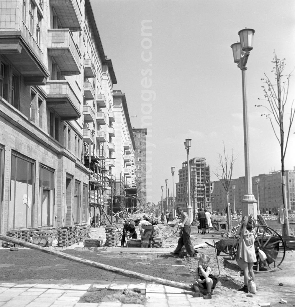 GDR picture archive: Berlin - Construction work in the newly built Stalinallee (today Karl-Marx-Allee) in the Friedrichshain district of East Berlin in the territory of the former GDR, German Democratic Republic