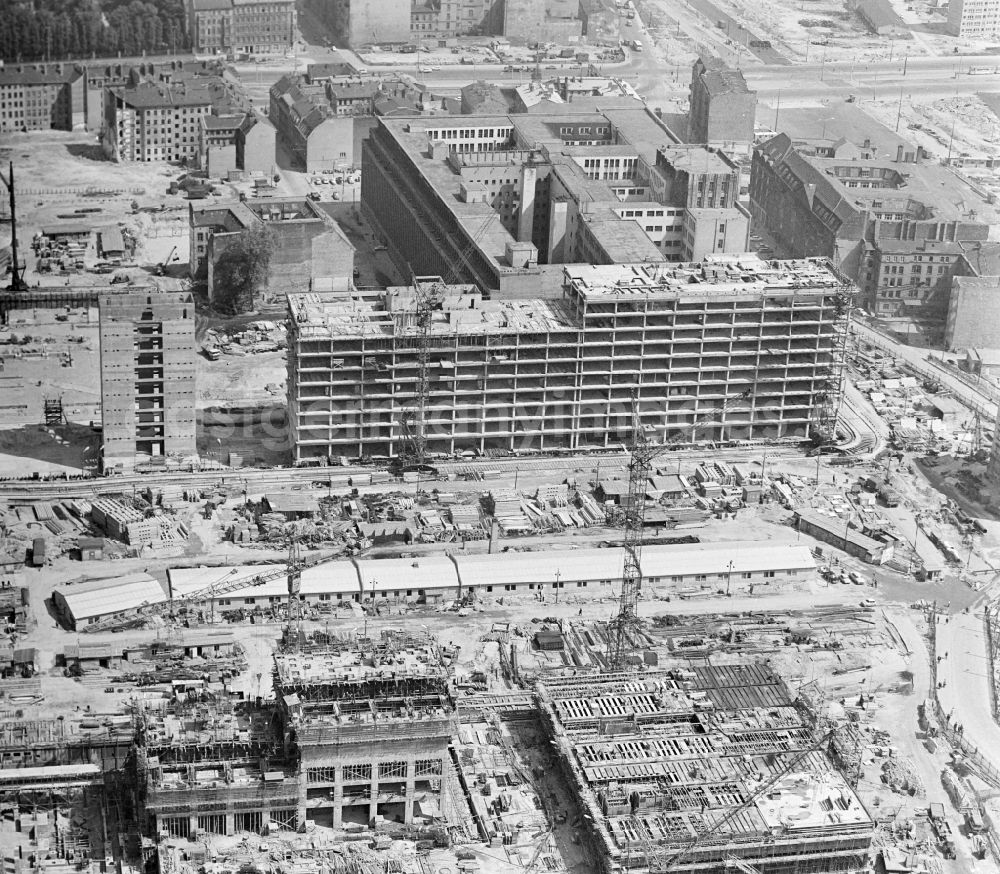 GDR photo archive: Berlin - View from the television tower to the construction site Hotel Stadt Berlin today Park Inn by Radisson and the House of the Electrical Industry at Alexanderplatz on Alexanderstrasse in the district Mitte in Berlin, the former capital of the GDR, German Democratic Republic