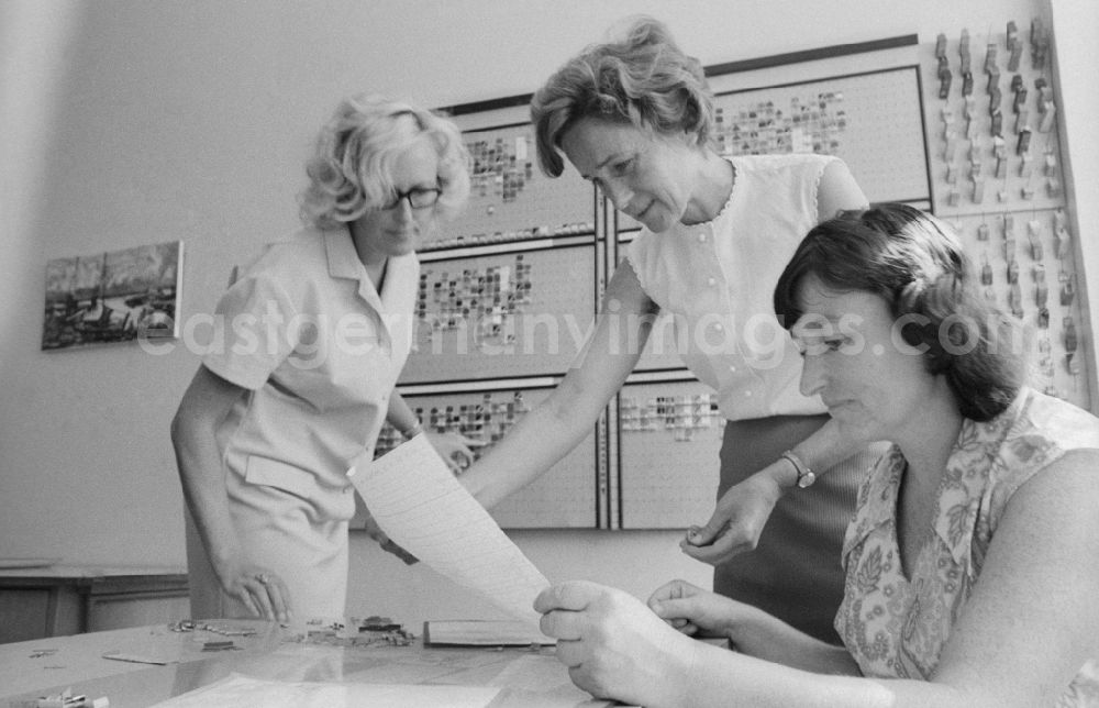 GDR image archive: Berlin - Beginning of a new school year - Preparations in the staff room in Berlin, the former capital of the GDR, the German Democratic Republic