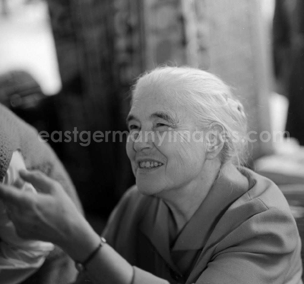 GDR picture archive: Berlin Mitte - Known East German writer Anna Seghers on a book bazaar on the occasion of the 1st May in Berlin - Mitte