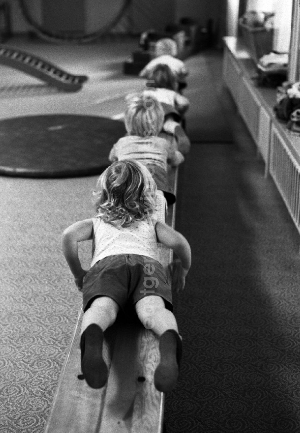 GDR image archive: Berlin - Games and fun with toddlers in kindergarten in physical education in a gym in Berlin Eastberlin on the territory of the former GDR, German Democratic Republic