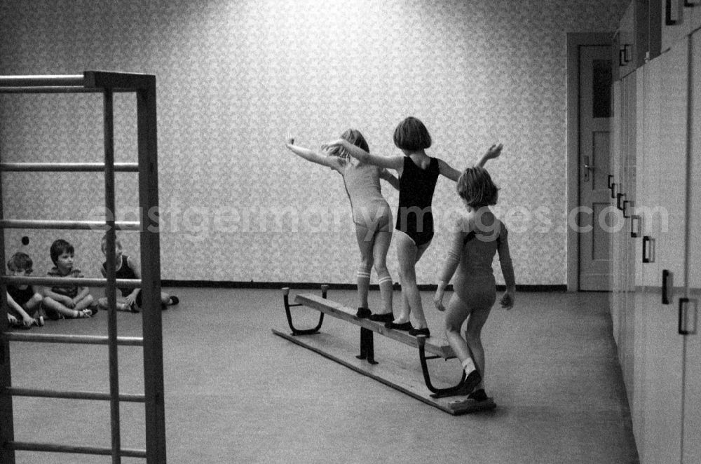 GDR image archive: Berlin - Games and fun with toddlers in kindergarten in physical education in a gym in Berlin Eastberlin on the territory of the former GDR, German Democratic Republic