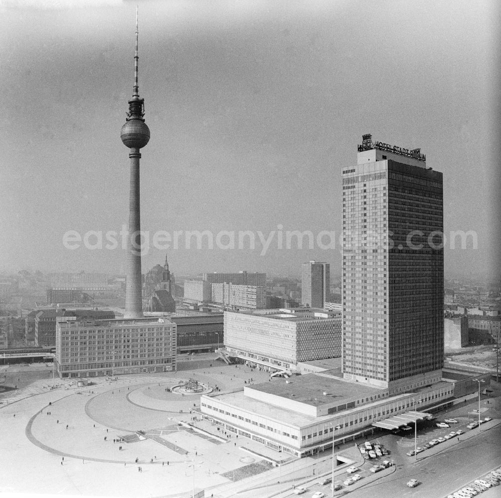 GDR image archive: Berlin - Overlooking the Alexanderplatz with the Hotel Stadt Berlin, the Centrum department store, the Fountain of International Friendship, the Alexanderplatz station and the TV tower in Berlin, the former capital of the GDR, the German Democratic Republic