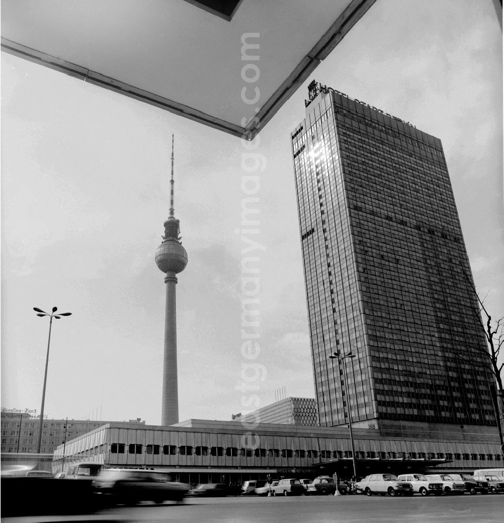 GDR photo archive: Berlin - Overlooking the Alexanderplatz with the Hotel Stadt Berlin, the Centrum department store, the Fountain of International Friendship, the Alexanderplatz station and the TV tower in Berlin, the former capital of the GDR, the German Democratic Republic