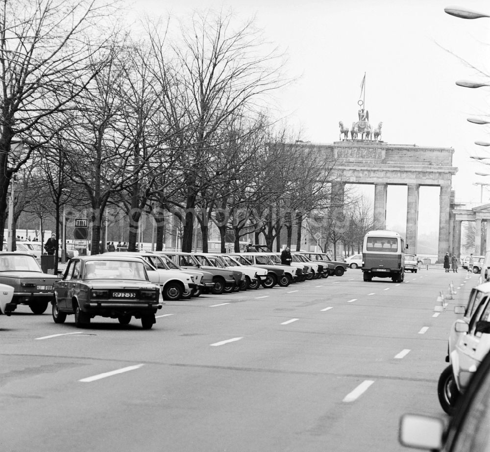 GDR photo archive: Berlin - Views of the Brandenburg Gate with the Quadriga of the street Unter den Linden in Berlin, the former capital of the GDR, the German Democratic Republic. The construction of the Berlin Wall in 1961 - the bulwark of the East - belonged to the Brandenburg Gate to the border-restricted area. It became a symbol of the Cold War