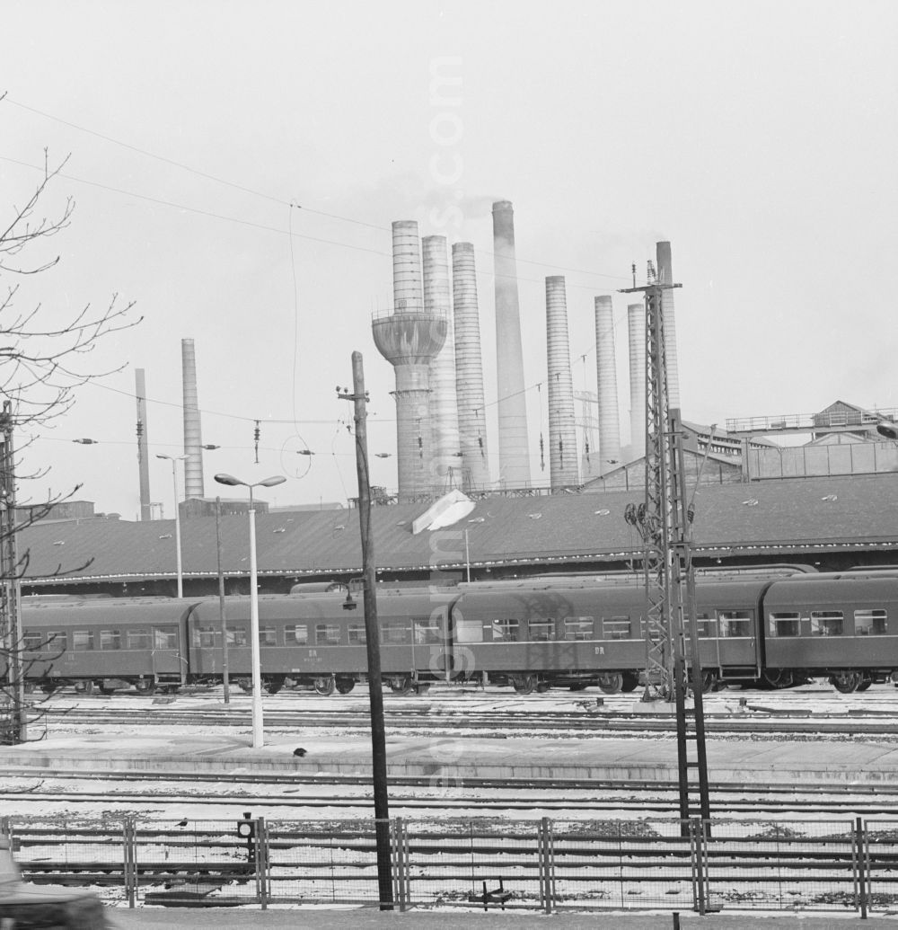 Riesa: Overlooking the grounds of the Deutsche Reichsbahn in Riesa in Saxony in the area of the former GDR, German Democratic Republic. In the background the chimneys of the steelworks