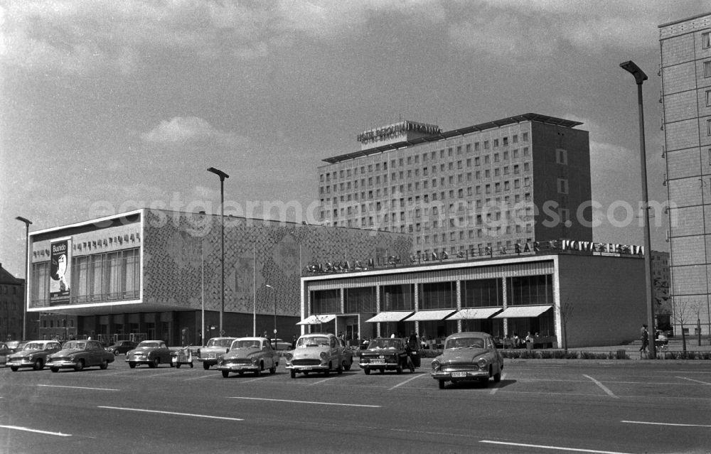 GDR image archive: Berlin - Friedrichshain - View from the Karl-Marx-Allee to the Hotel Berolina in the background, in front of the cinema International (left) and the mocha-milk-polar bar (right) in Berlin - Mitte