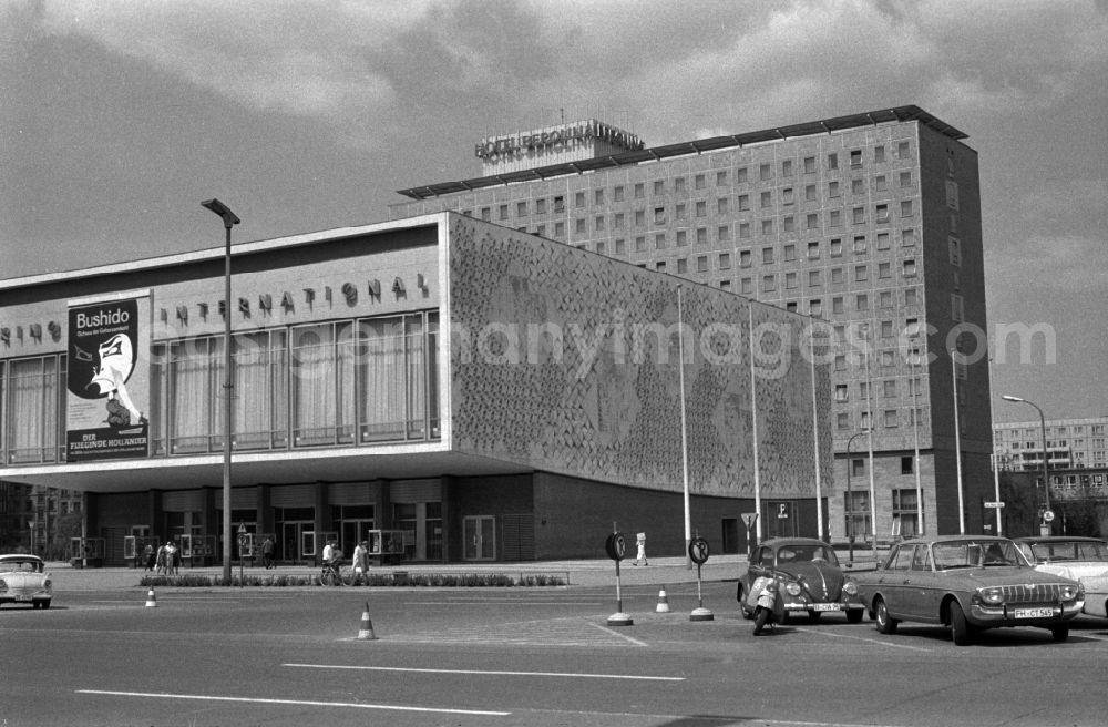 GDR picture archive: Berlin - Friedrichshain - View from the Karl-Marx-Allee to the Hotel Berolina in the background, in front of the cinema International (left) and the mocha-milk-polar bar (right) in Berlin - Mitte