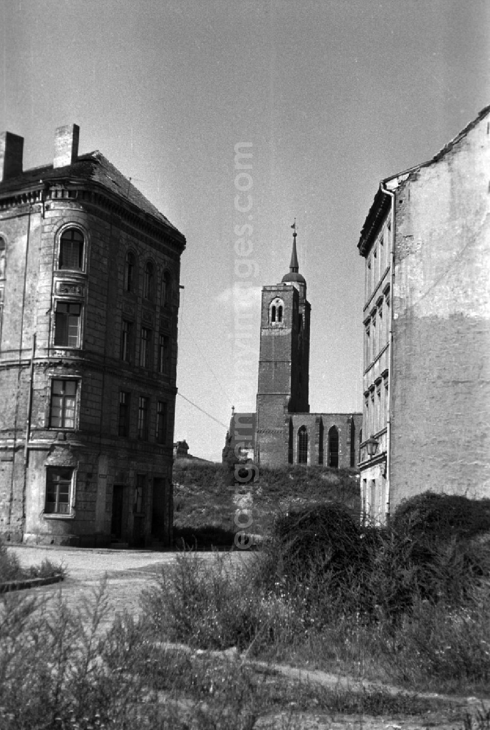 GDR image archive: Magdeburg - View of the west side of St. John's church by two old buildings in Magdeburg