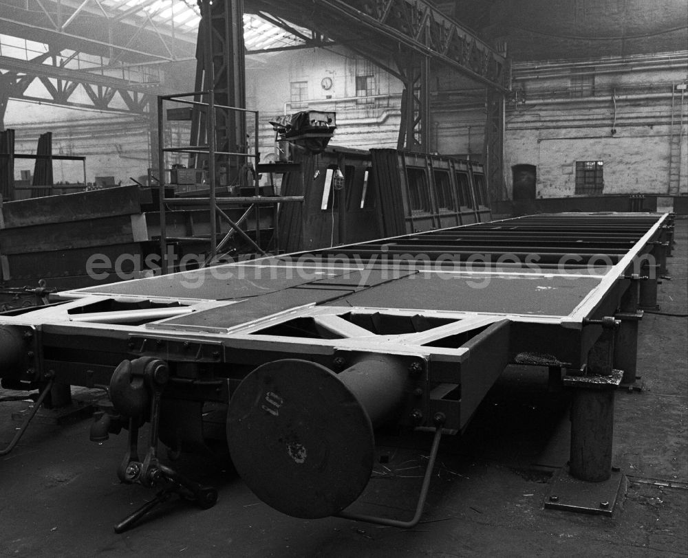 GDR picture archive: Halberstadt - New construction of a floor section in the depot of the Deutsche Reichsbahn for the production of an express train car in Halberstadt in the state of Saxony-Anhalt in the area of the former GDR, German Democratic Republic