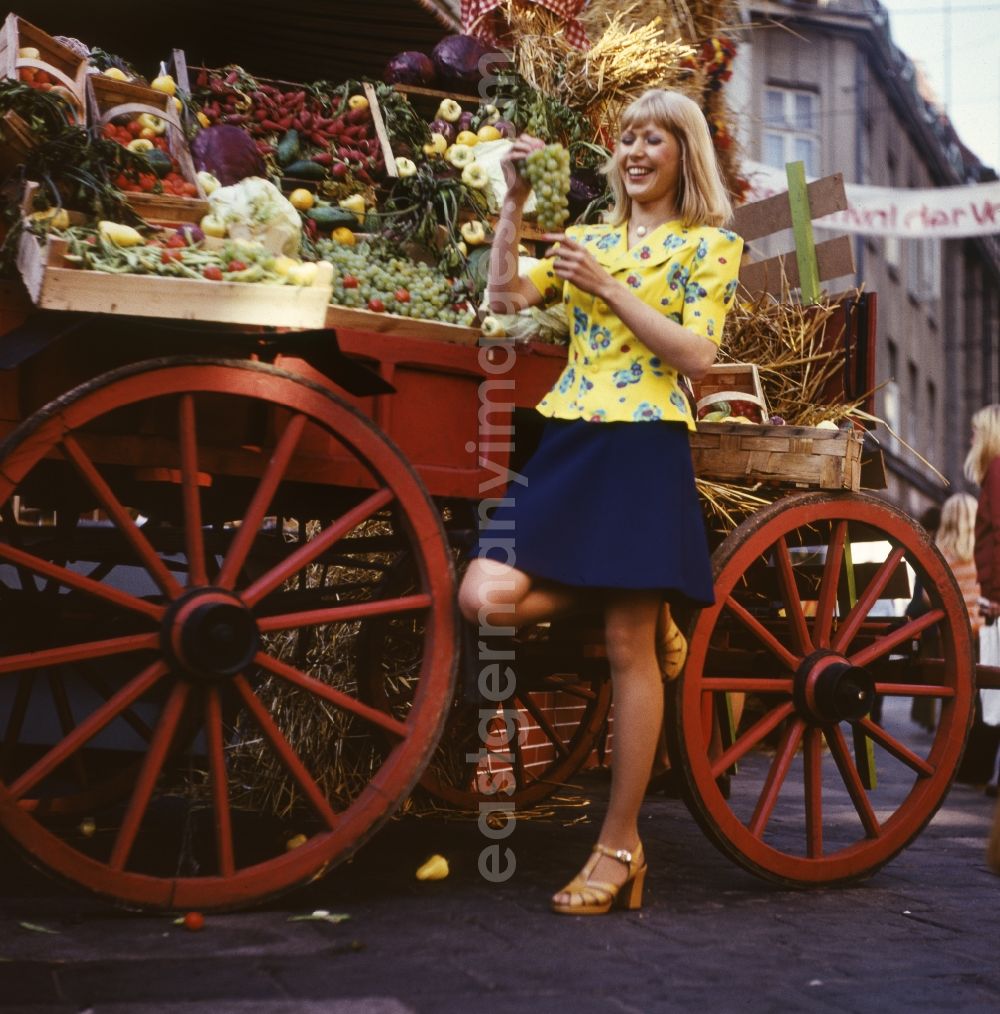 GDR picture archive: Berlin - Young woman presents current women's fashion collection the summer fashion in Berlin, the former capital of the GDR, German Democratic Republic