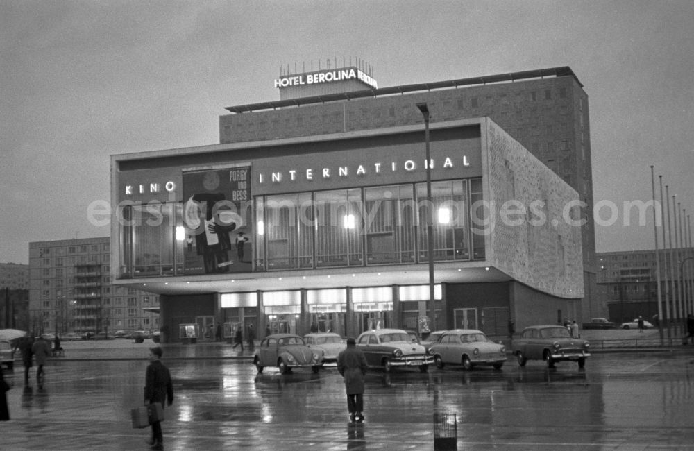 GDR photo archive: Berlin - Mitte - The cinema International at the Karl-Marx-Allee in Berlin - Mitte. In the background is the Hotel Berolina. Here the western facade of the cinema with a concrete relief
