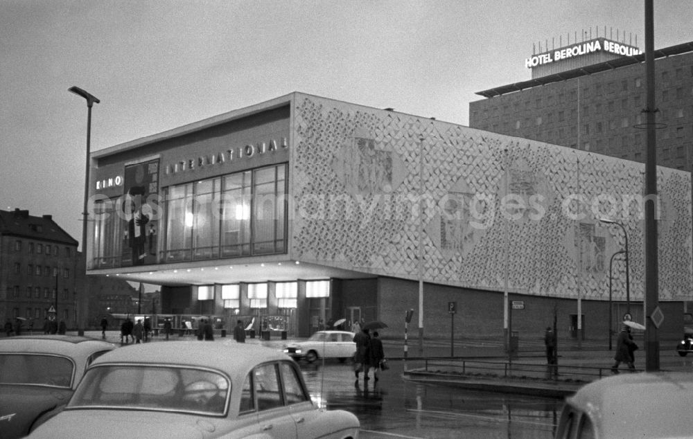 GDR picture archive: Berlin - Mitte - The cinema International at the Karl-Marx-Allee in Berlin - Mitte. In the background is the Hotel Berolina. Here the western facade of the cinema with a concrete relief