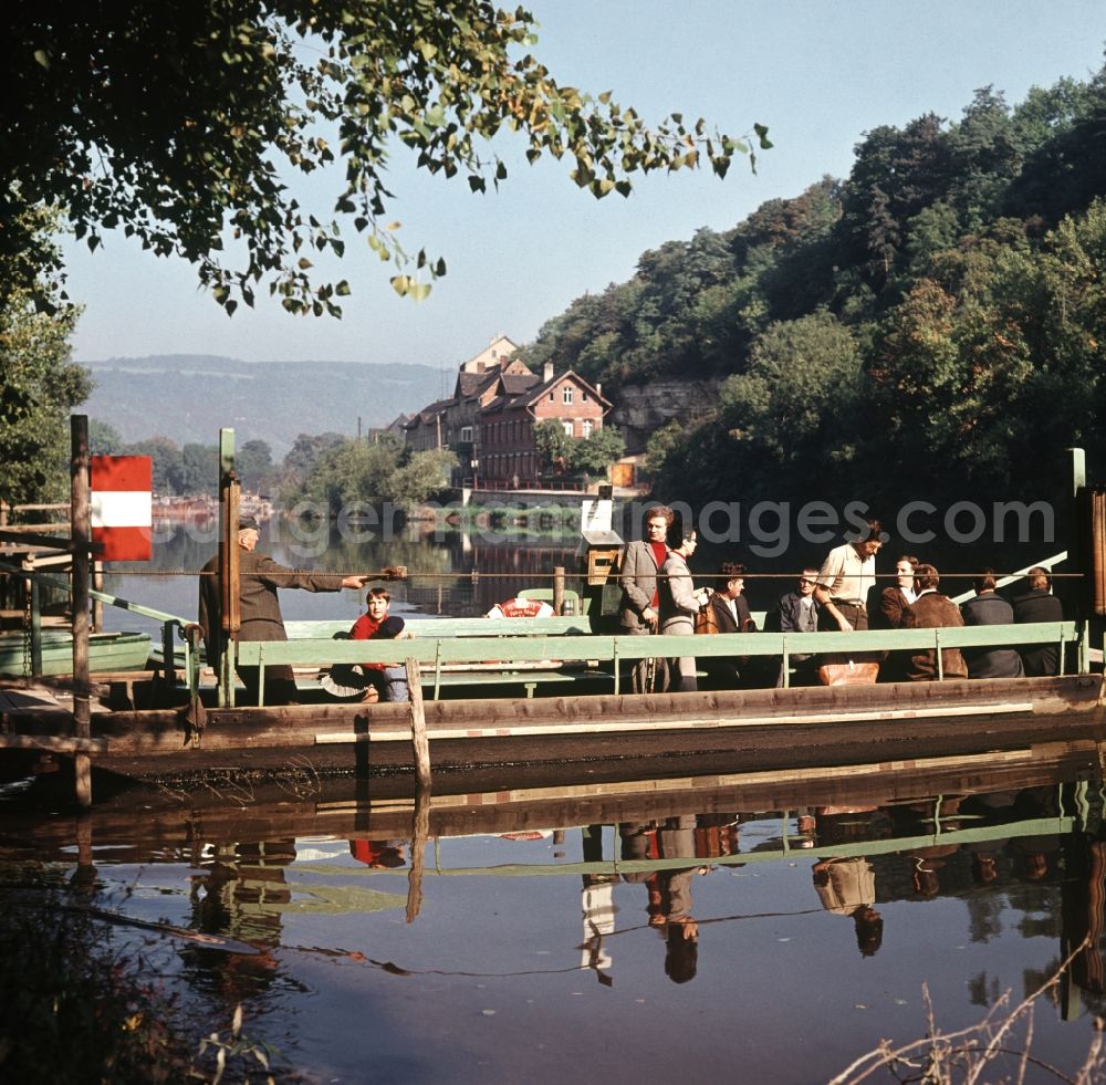 GDR image archive: Bad Kösen - Passengers when driving on a hand-cranked ferry across the river Saale near Bad Kösen