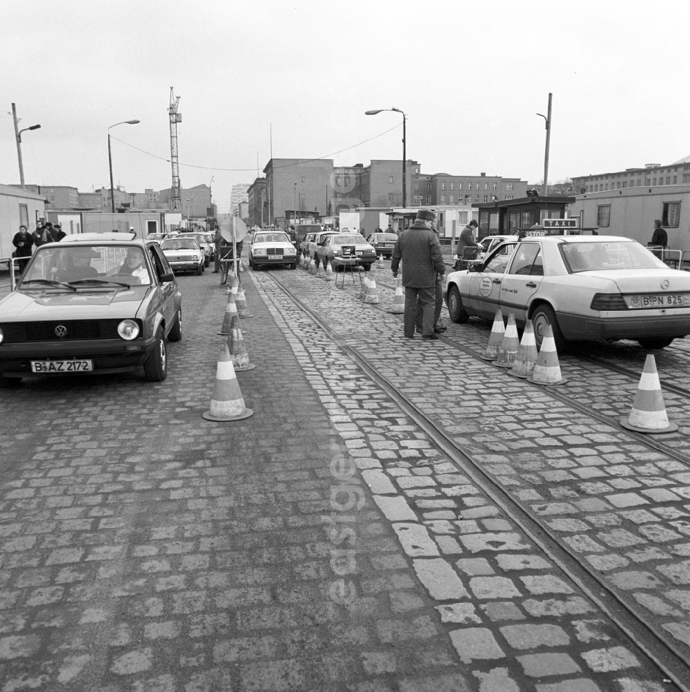 GDR photo archive: Berlin - East German border guards check the provisional transition Potsdamer Platz West German cars