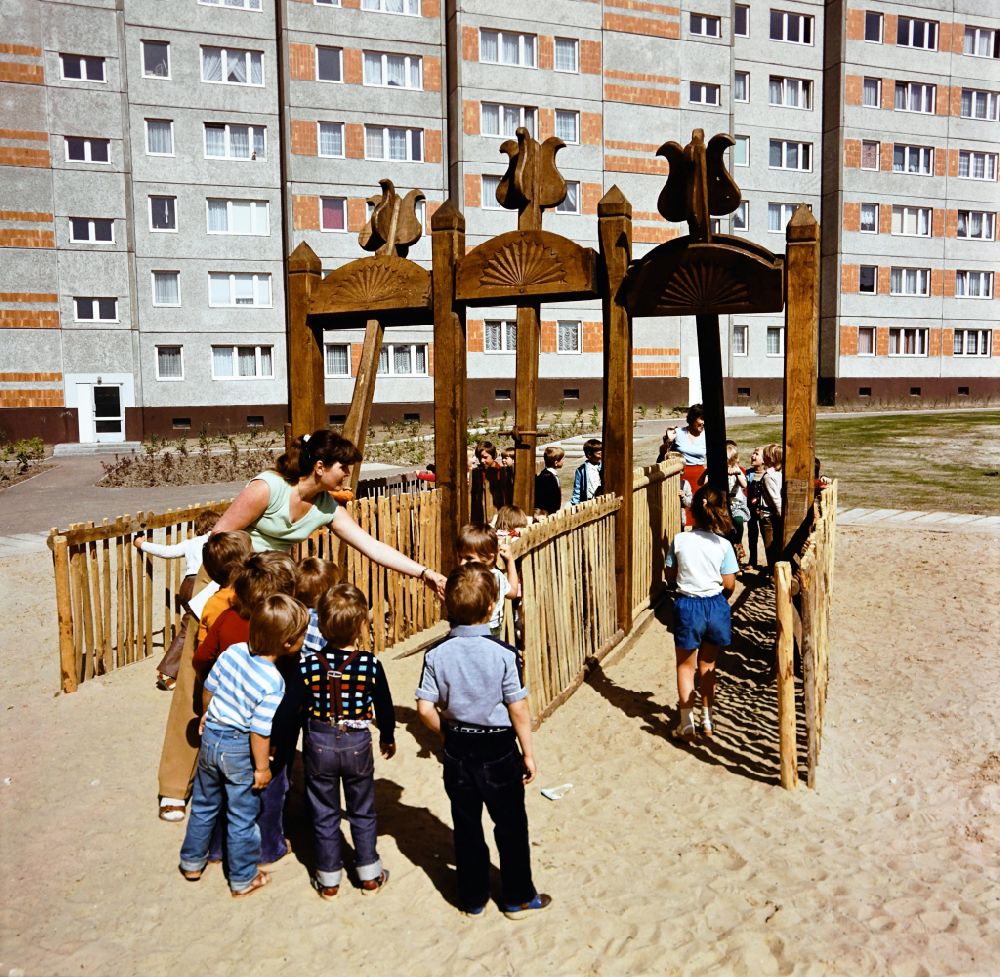 GDR image archive: Berlin - Children play on a playground in the Marzahn residential area in Berlin Eastberlin on the territory of the former GDR, German Democratic Republic