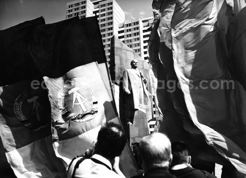 GDR photo archive: Berlin - Demonstration of flag bearers for May 1st in front of the Lenin memorial at Leninplatz, today's United Nations Square, in the Friedrichshain district of Berlin, the former capital of the GDR, German Democratic Republic