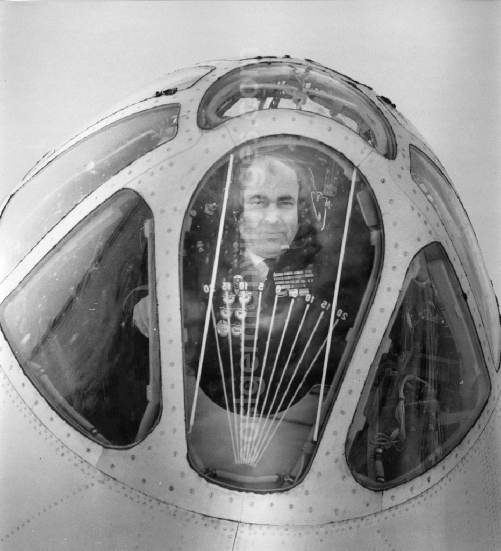 GDR picture archive: Schönefeld - The chief instructor of the INTERFLUG pilots Dmitri Ivanovich Barilow in the cockpit of a TU 1