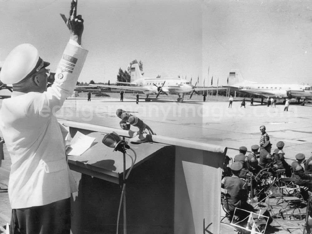 GDR photo archive: Schönefeld - The Director General of Deutsche Lufthansa, Arthur Pieck, are at the end of his speech, the signal for the start of 3 IL-14 in Schoenefeld in Brandenburg. On 16 June 1957, the domestic traffic of Deutsche Lufthansa was officially opened on Berlin's central Schoenefeld Airport