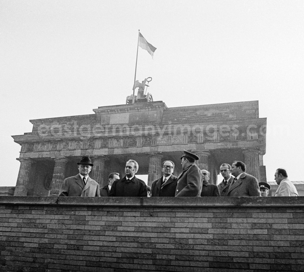 GDR photo archive: Berlin - The commander of the Soviet sector of Berlin, general Artur Kunath, with politicians at the Brandenburg Gate in Berlin, the former capital of the GDR, German democratic republic