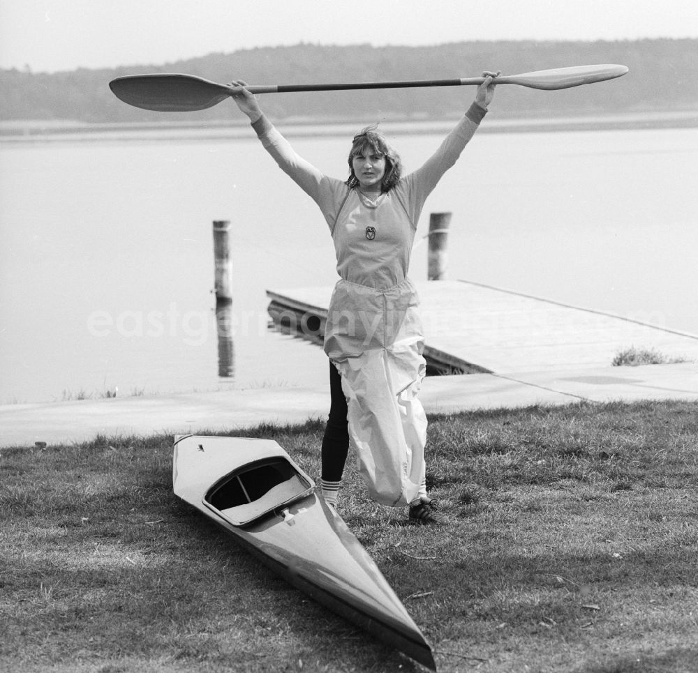 GDR photo archive: Beetzsee - The German canoeist Birgit Fischer am Beetzsee in Brandenburg today. 1984 and 1993 Birgit Schmidt. She was a member of the Army Sports clubs forward Potsdam