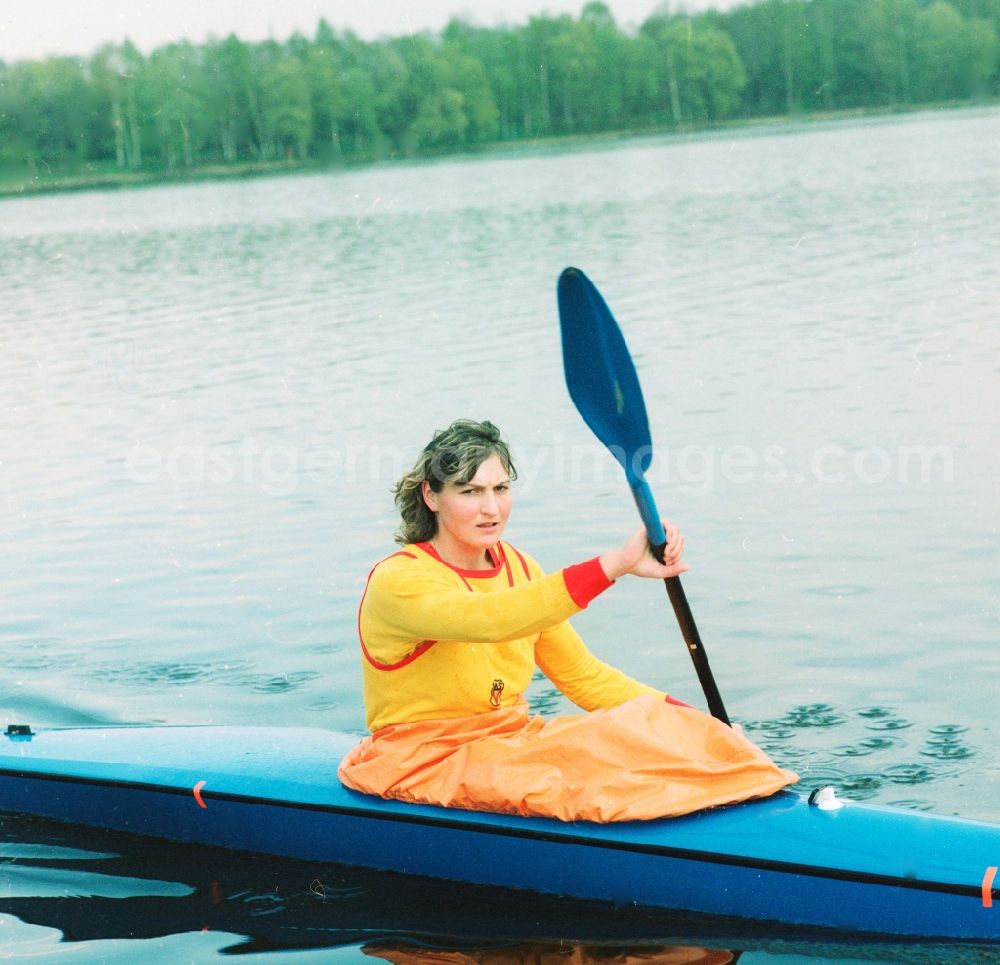 GDR image archive: Beetzsee - The German canoeist Birgit Fischer am Beetzsee in Brandenburg today. 1984 and 1993 Birgit Schmidt. She was a member of the Army Sports clubs forward Potsdam