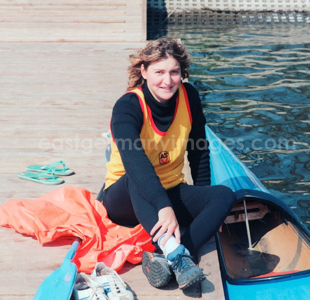 GDR photo archive: Beetzsee - The German canoeist Birgit Fischer am Beetzsee in Brandenburg today. 1984 and 1993 Birgit Schmidt. She was a member of the Army Sports clubs forward Potsdam