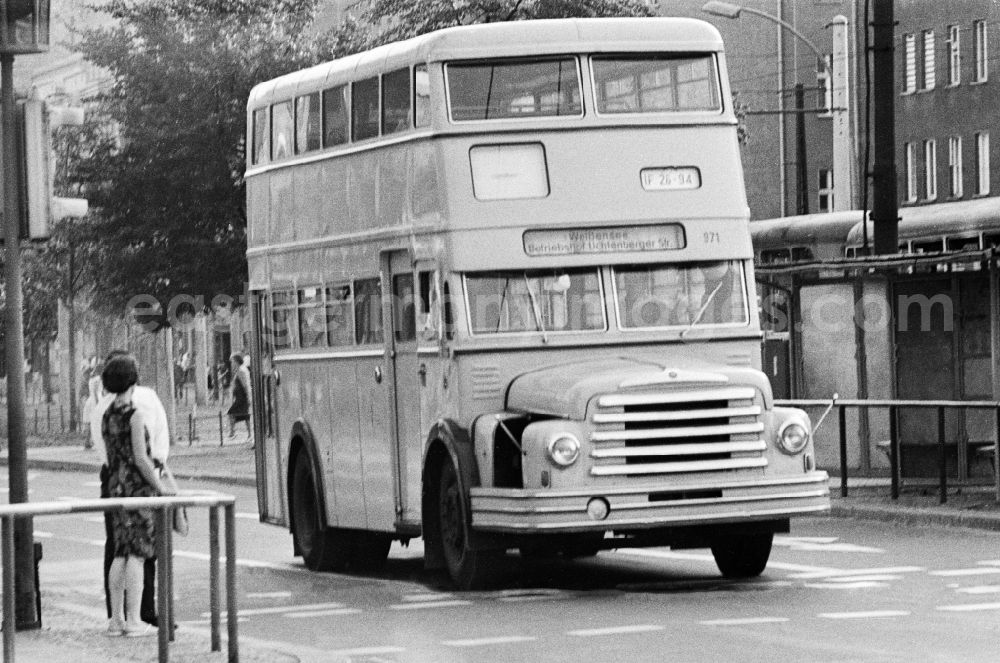 GDR image archive: Berlin - A double-decker bus Do 54/56 with sheet wood structure and hood motor BVG-Ost (BVG) in Berlin, the former capital of the GDR, German Democratic Republic