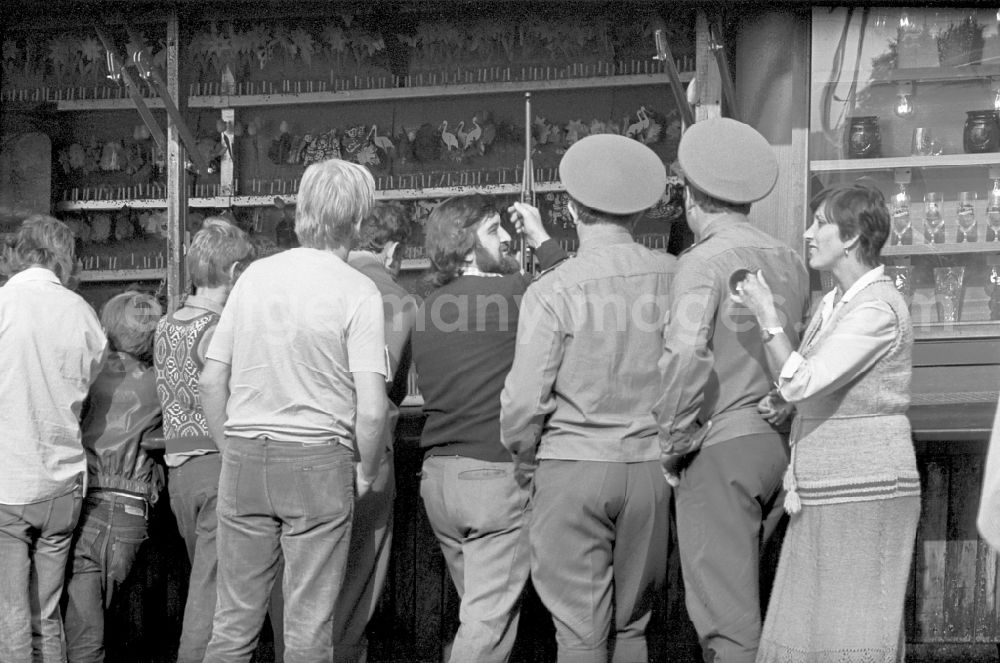 GDR photo archive: Paaren - Residents and guests as participants in the events on the occasion of a village festival with fairground rides in Paaren, Brandenburg on the territory of the former GDR, German Democratic Republic