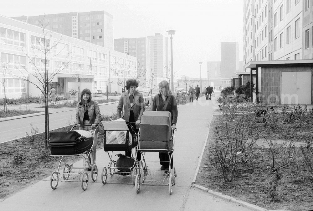 Berlin: Three mothers by baby carriage in Berlin, the former capital of the GDR, German democratic republic