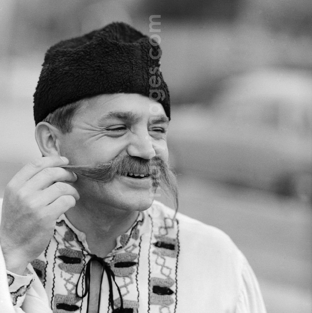 GDR image archive: Chemnitz - A Bulgarian folklore dancers with fur hat and mustache in Chemnitz in Saxony today