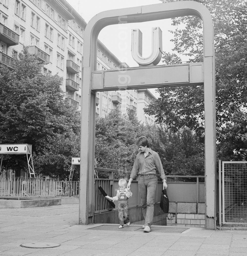 GDR photo archive: Berlin - A father comes with his child on the stairs underground station Straussberger place high, in Berlin, the former capital of the GDR, the German Democratic Republic