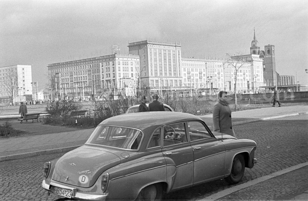 GDR photo archive: Magdeburg - A Wartburg 311 parked on the street on the way widths in Magdeburg in Saxony - Anhalt. In the background, the St. Johannis Church is to see