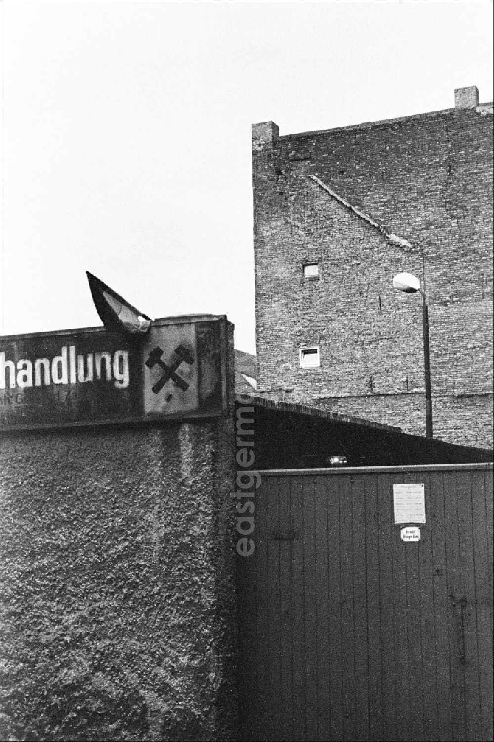GDR picture archive: Berlin - Gate to the entrance area of the coal trade on Steinstrasse in the Mitte district of Berlin East Berlin in the territory of the former GDR, German Democratic Republic