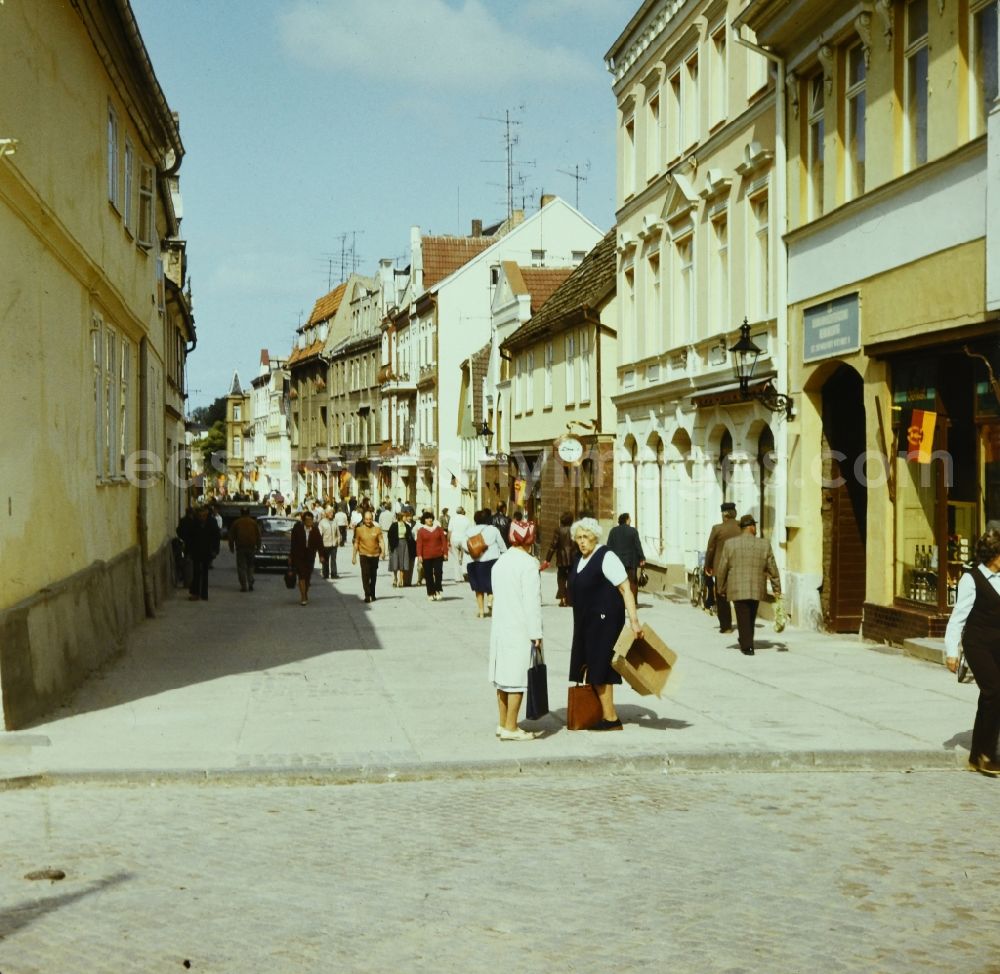 GDR picture archive: Waren (Müritz) - Tourist attraction, strolling and shopping street Marktstrasse in Waren (Mueritz) in the state Mecklenburg-Western Pomerania on the territory of the former GDR, German Democratic Republic