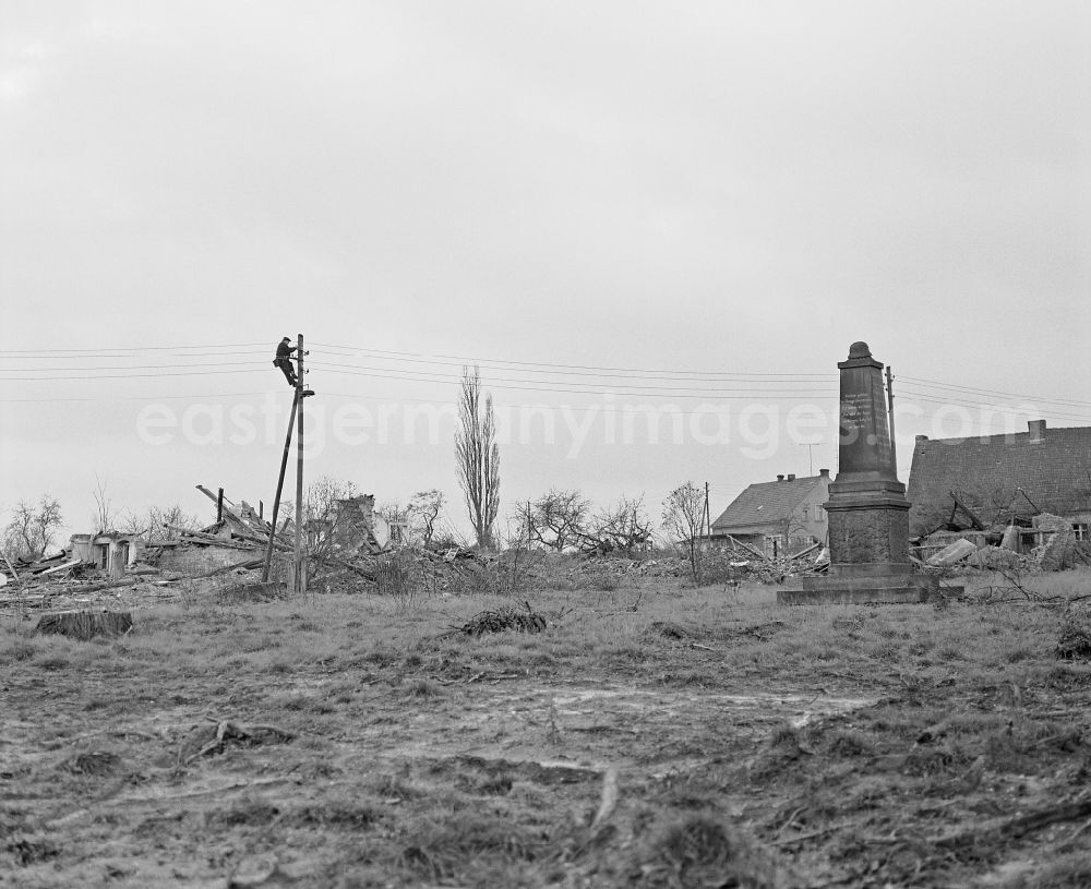GDR photo archive: Tschelln - Demolition work on cleared and depopulated areas to expand the opencast mine for brown coal mining in Tschelln, Saxony on the territory of the former GDR, German Democratic Republic